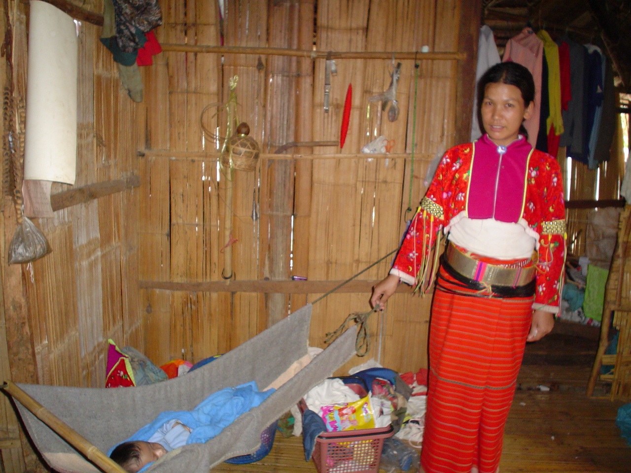 Thai mom and baby in swing